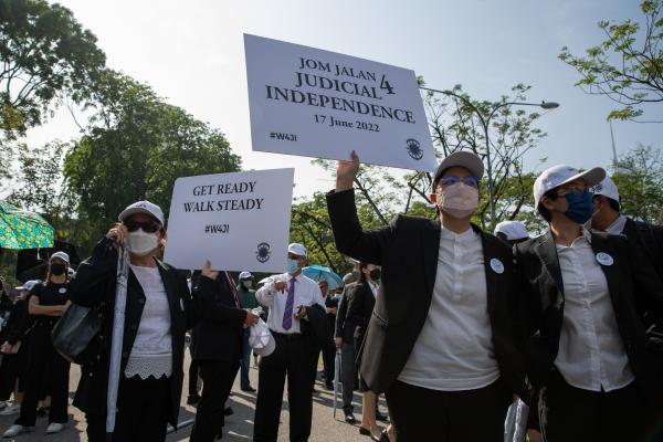 Image from Singles -  Lawyers holding placards in Padang Merbok, Kuala Lumpur...