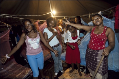 Women De-Miners, Mozambique. -  Relaxing in their tents in the evening, the womens...