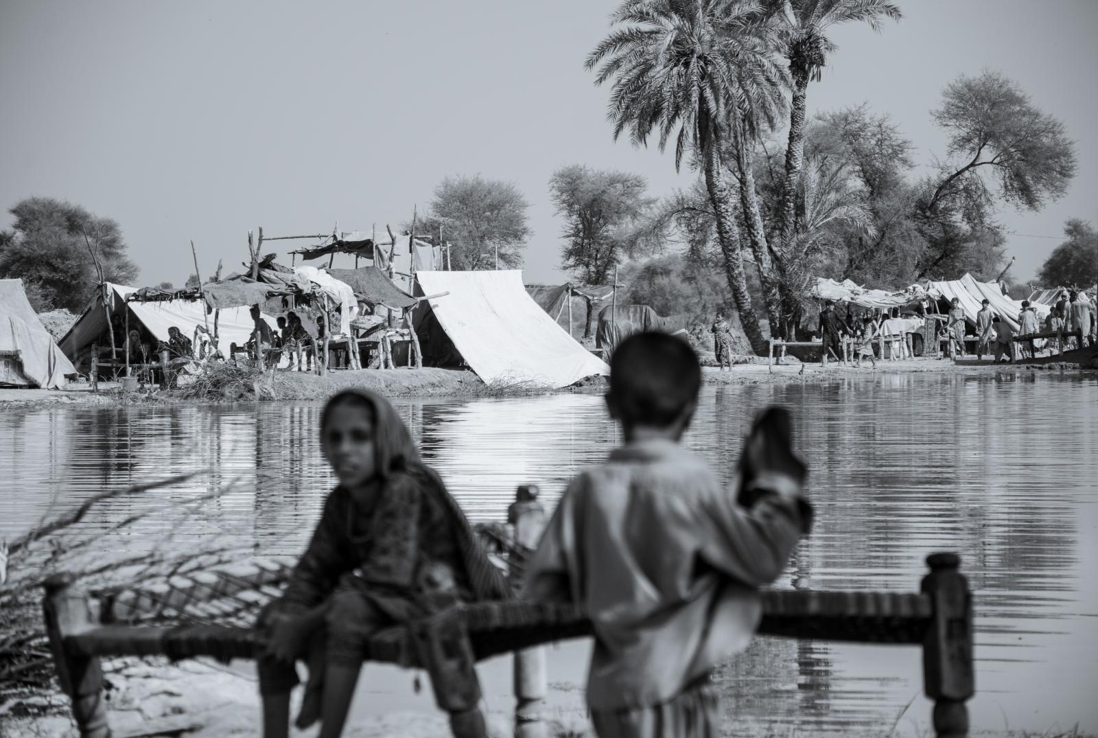 Discourses of Aftermath in Shikarpur - While her siblings play under the scorching sun; this...