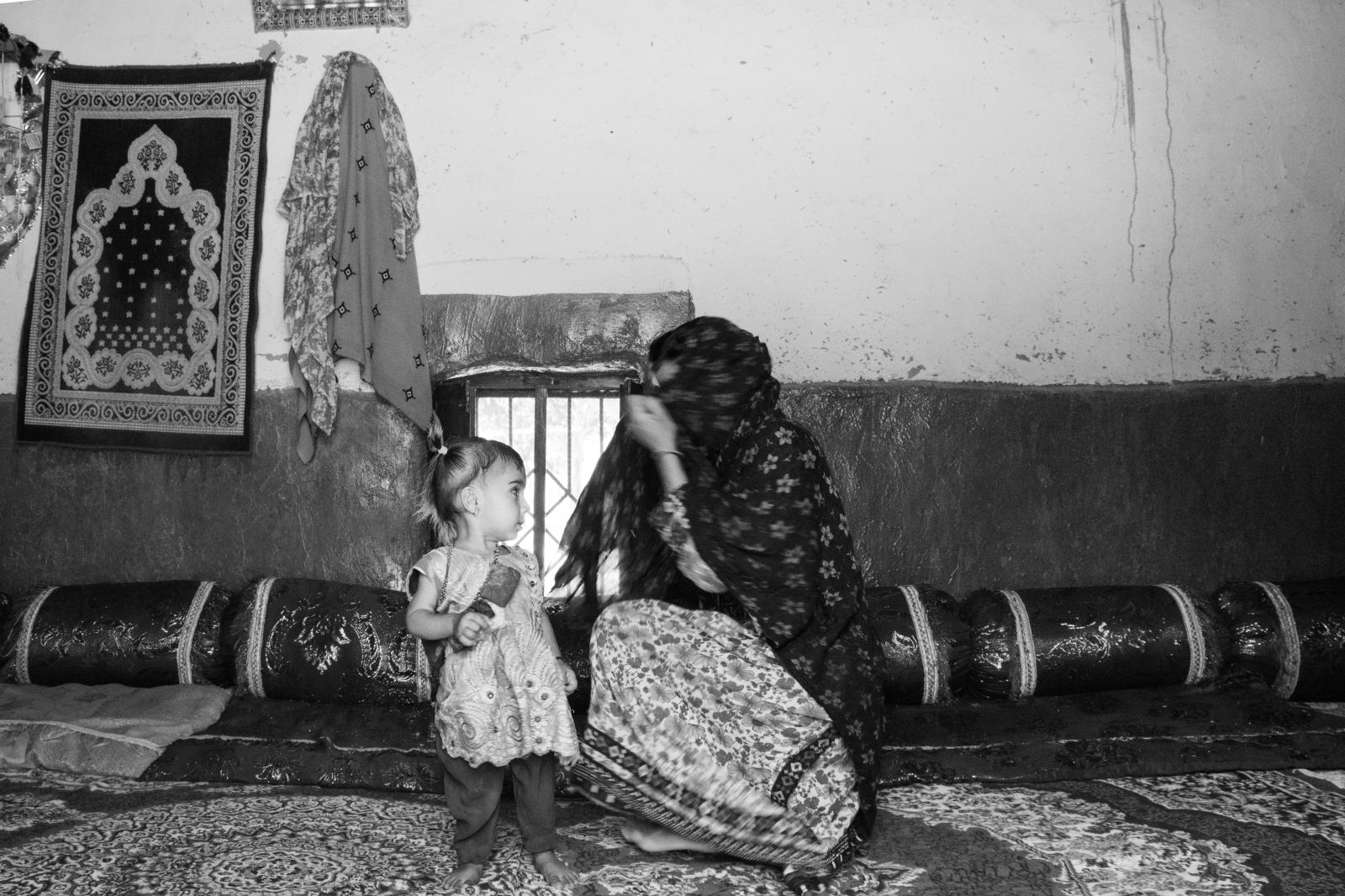 Luma’ (mother) - Fatima with her 1-year-old daughter. [Village of Moola...