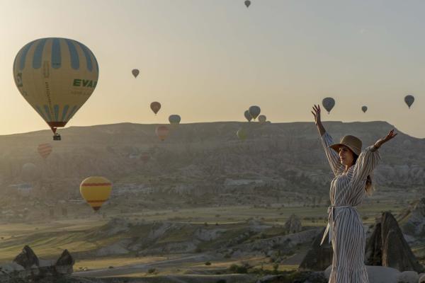 Image from Everyday Turkey - Cappadocia, 2019. To take this photo, tourists have to...
