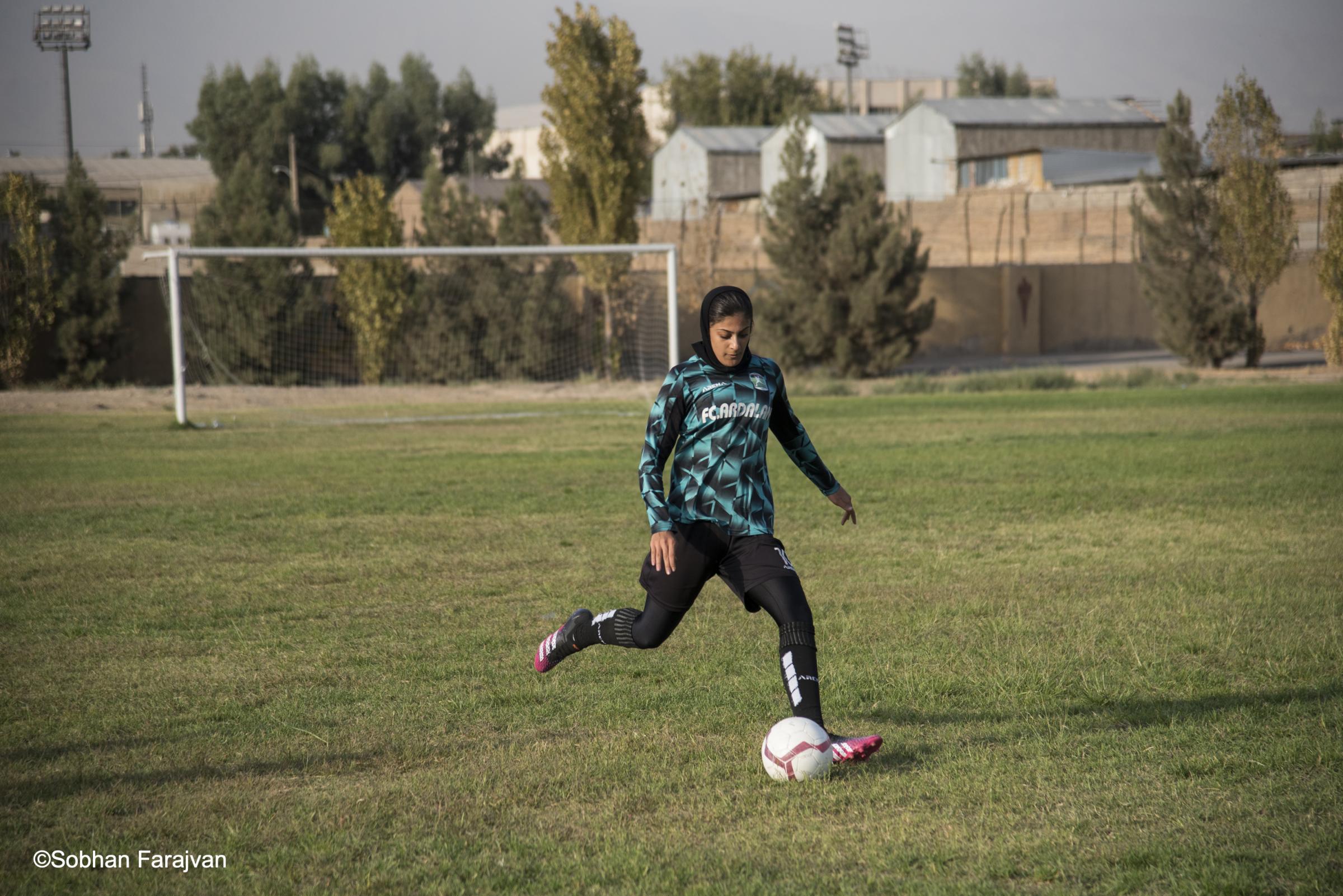 Iranian women's soccer academy (2022) - An Iranian girl player training soccer on the academy...