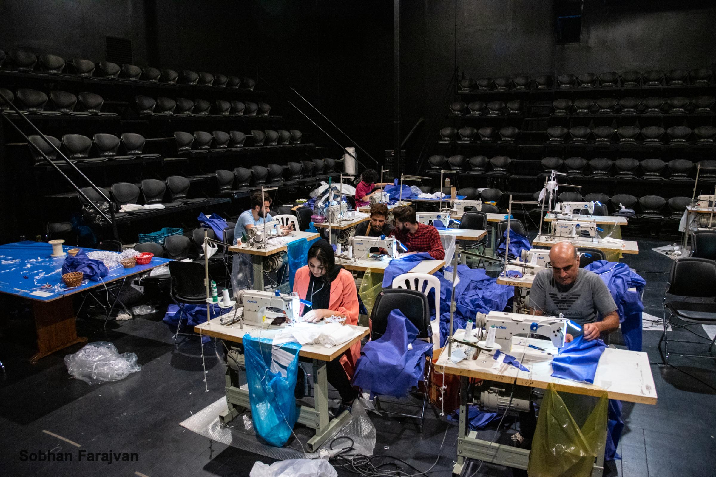 COVID-19 pandemic in Iran (2020-2022) - A volunteer group of theater members sew protection masks...