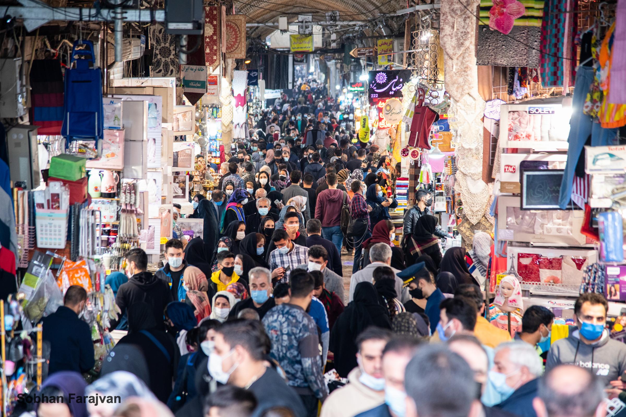 COVID-19 pandemic in Iran (2020-2022) - Crowds of people in Tehran's Grand Bazaar amid the...