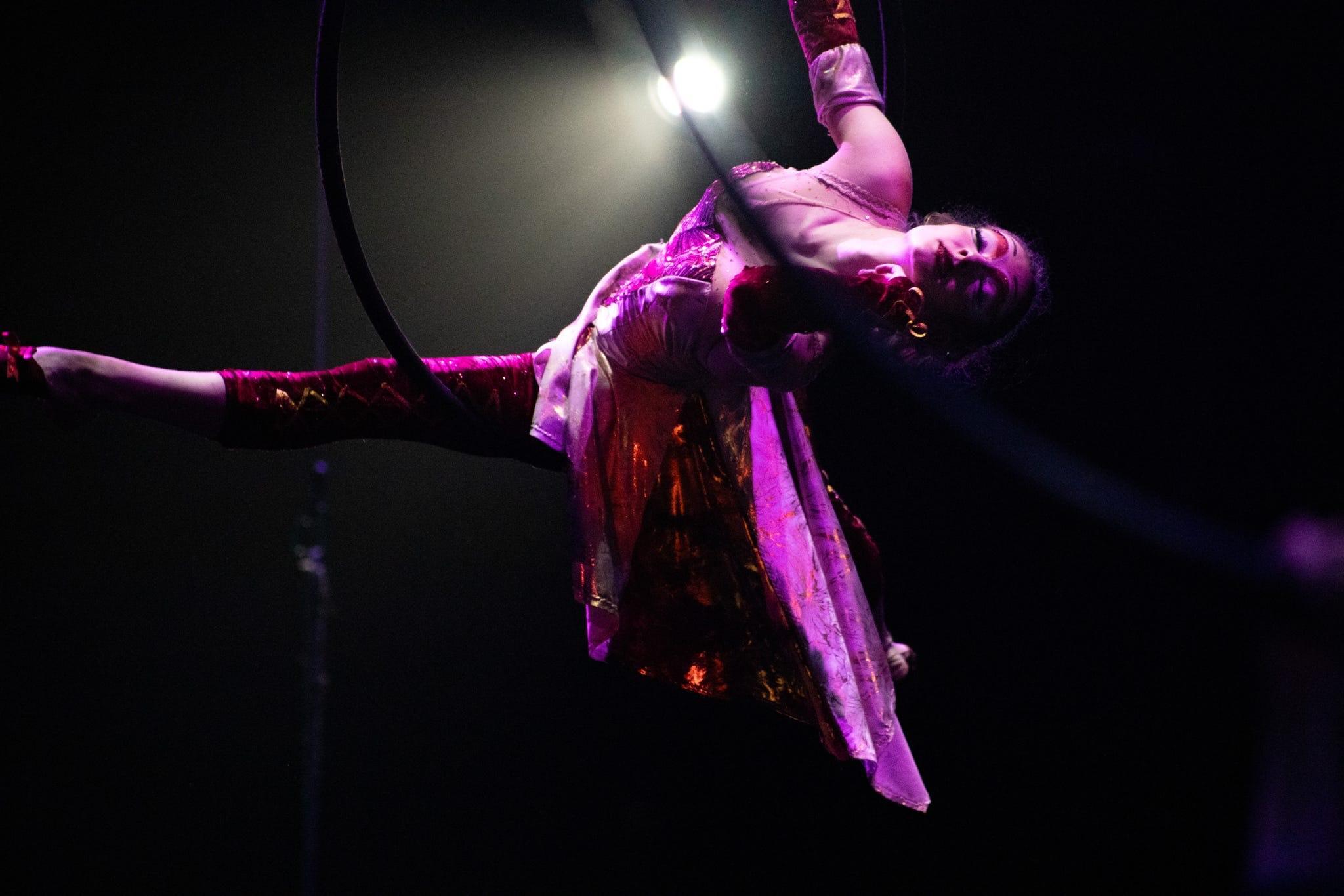 Singles -  Olivia Monson-Haefel performs with aerial hoops during...