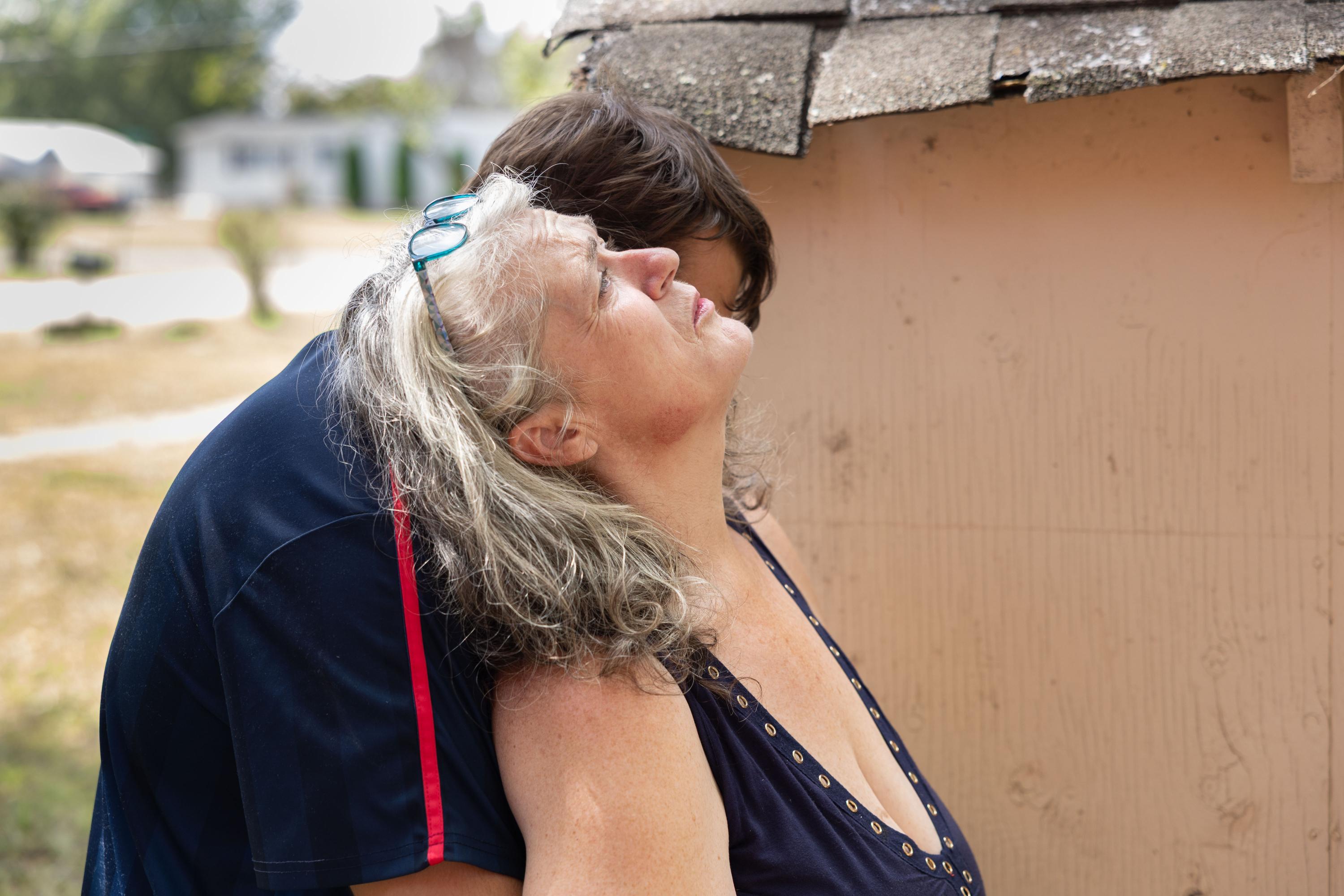 Carrie, Keeper of the House - Carrie Kuhl leans back against Austin Bledsoe about 30...