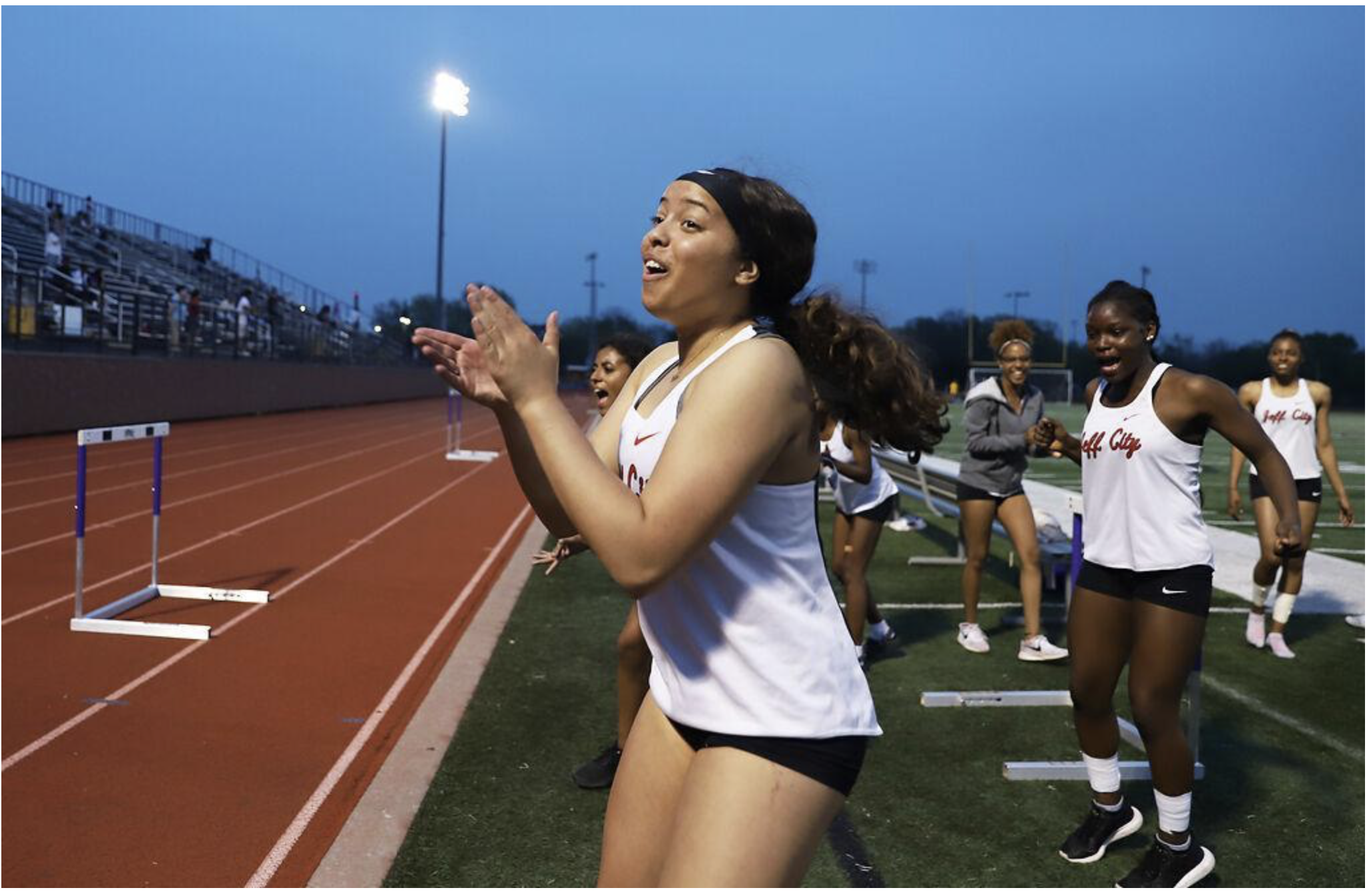Sports - Jefferson City High School junior Zaliah Dunbar cheers...