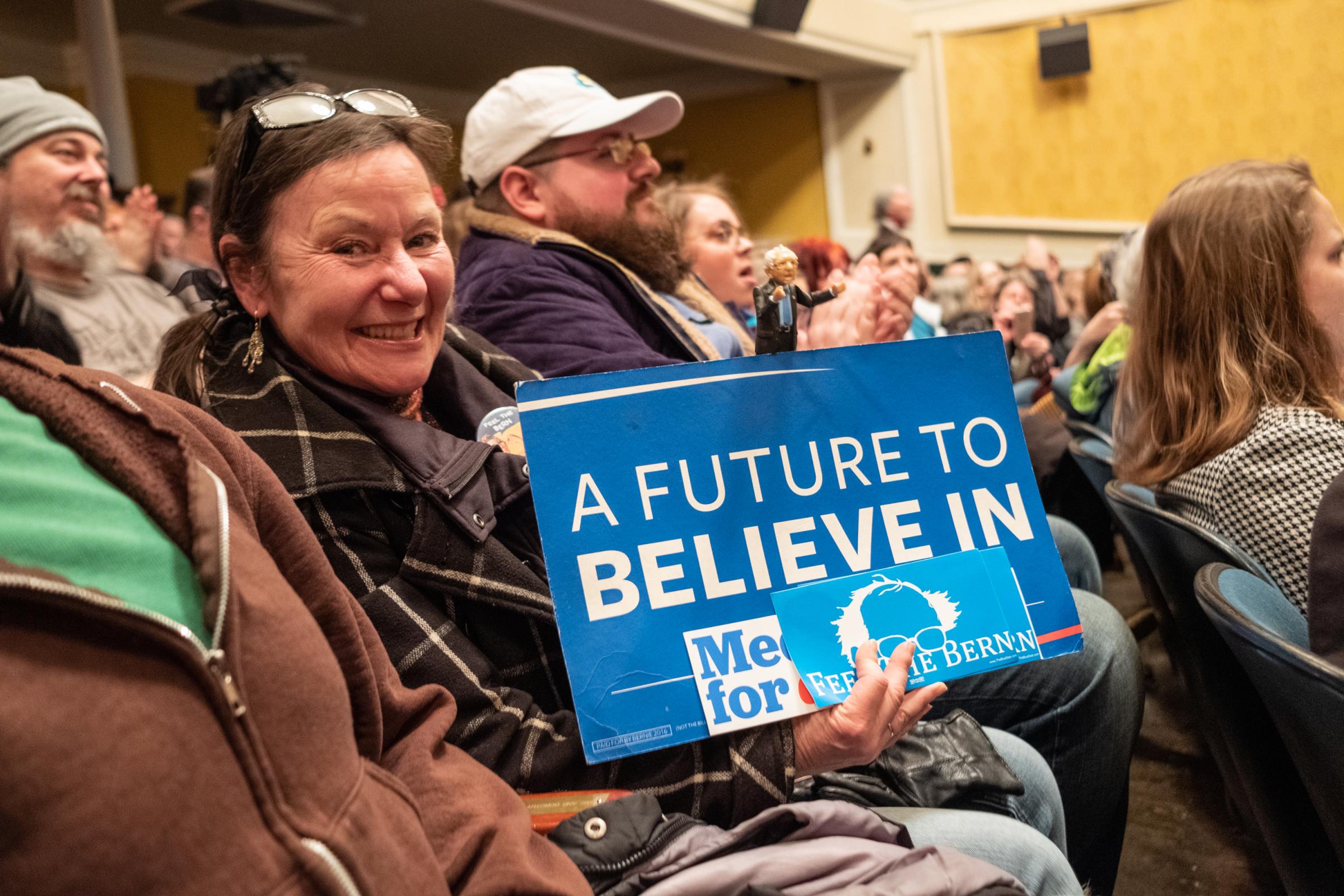 Bernie Sanders in Keene, NH - Gail Szafir of Troy, N.H., holds a Bernie Sanders...