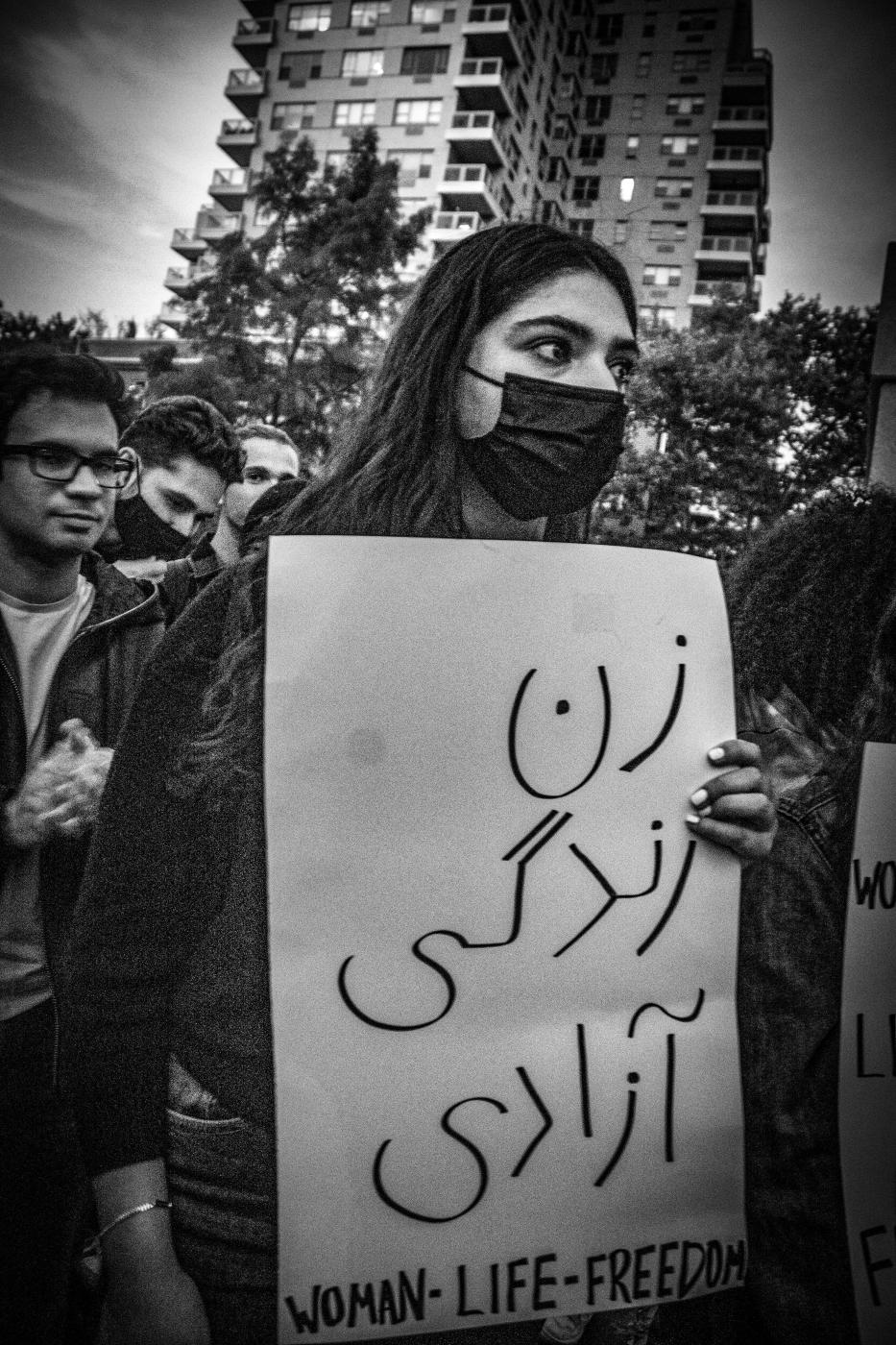 Young Iranians wear gas masks in protest against the poisioning of schoolgirls across Iran. 