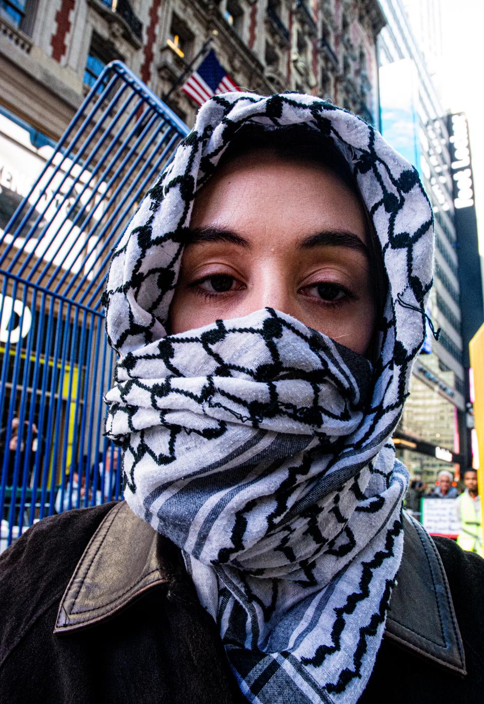 A young pro-Palestine demostrator at a Pro-Palestine rally in Times Square on October 13, 2023in New York City.