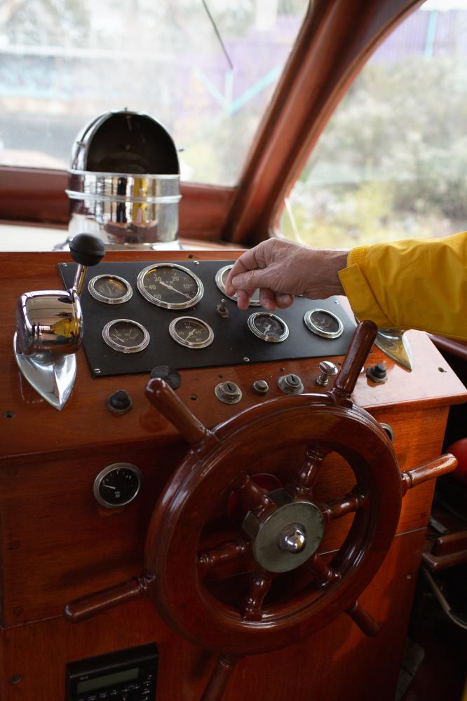Captain Toby at the Helm of the Robert Allan II