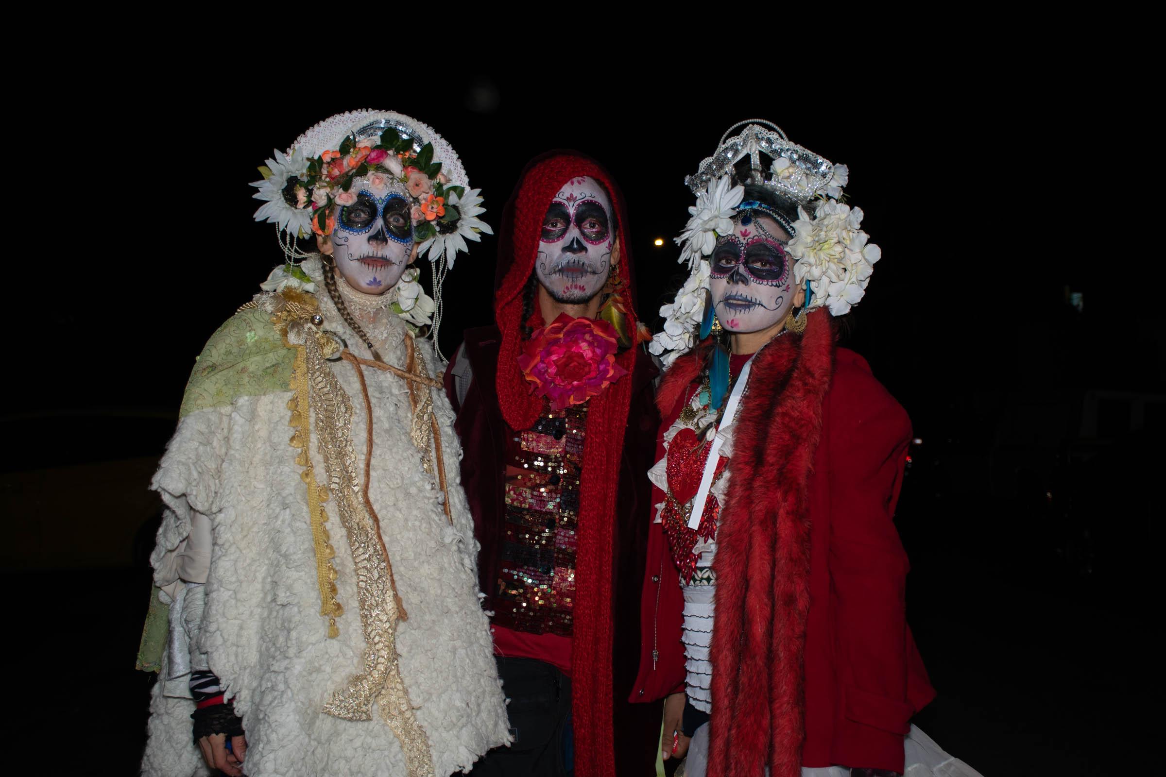 Day of the Dead Celebration - Cynthia from Brazil, right, and her friends dress as...