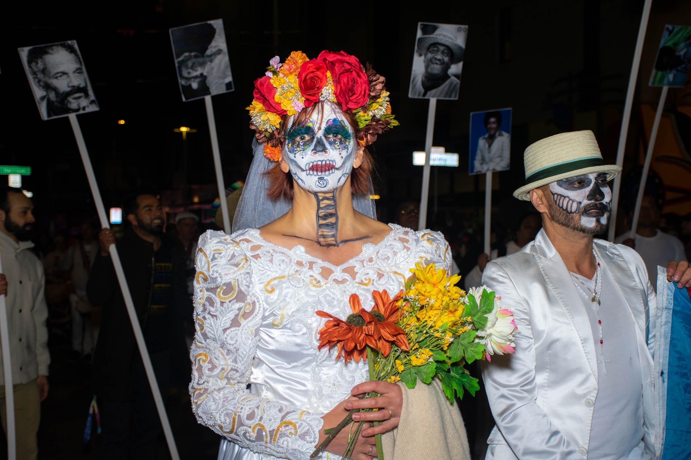 Day of the Dead Celebration - Participants of the Day of the Dead procession dress as...