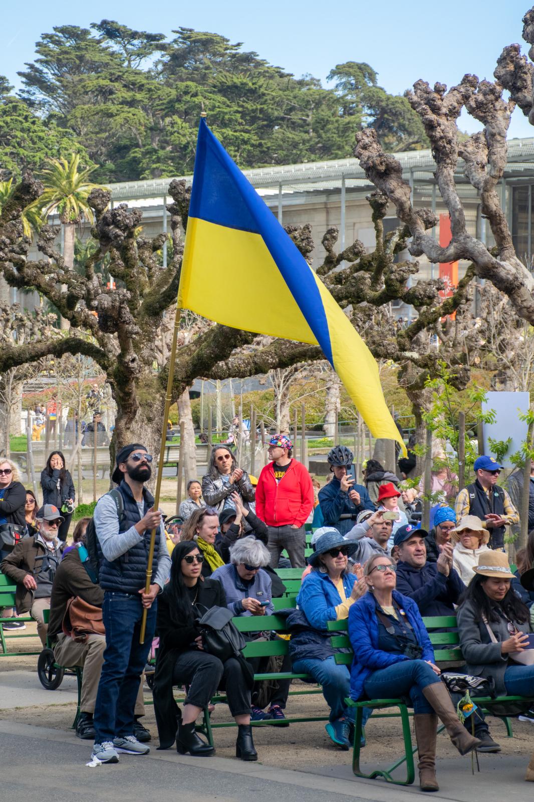  Michael Volpe holds a Ukrainian flag at the benefit concert in Golden Gate Park. Volpe came from Oakland to show his support to the Ukrainian...