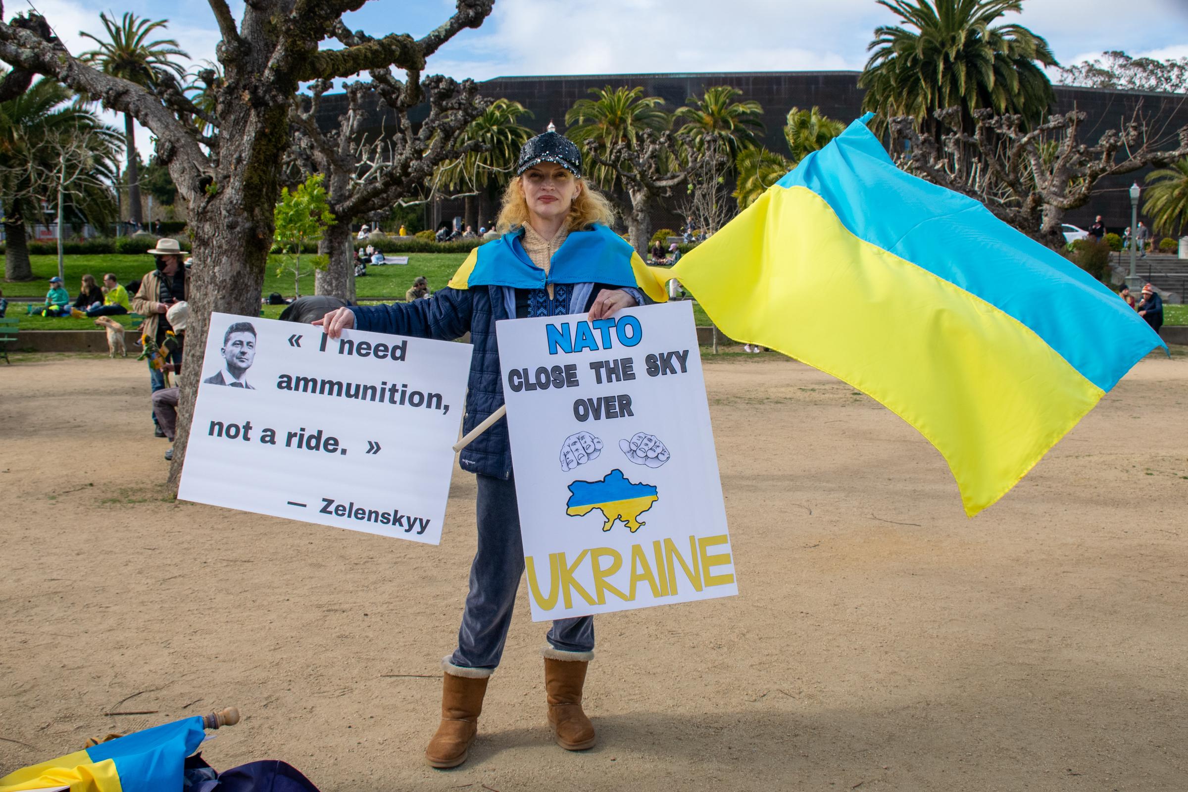 Concert for Ukraine -  Olena Avtukh, a Ukrainian citizen, holds up the signs...