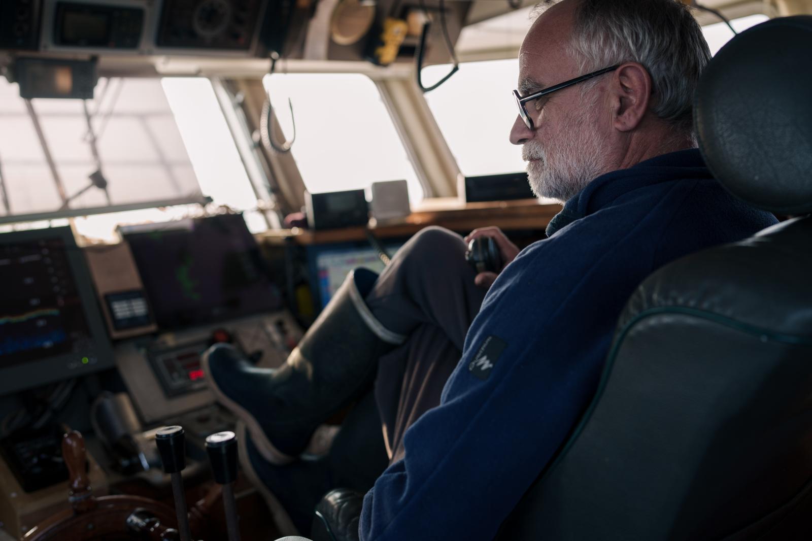 Image from Scapêche - Dominique, the captain, in his boat's cabin. Douarnenez...