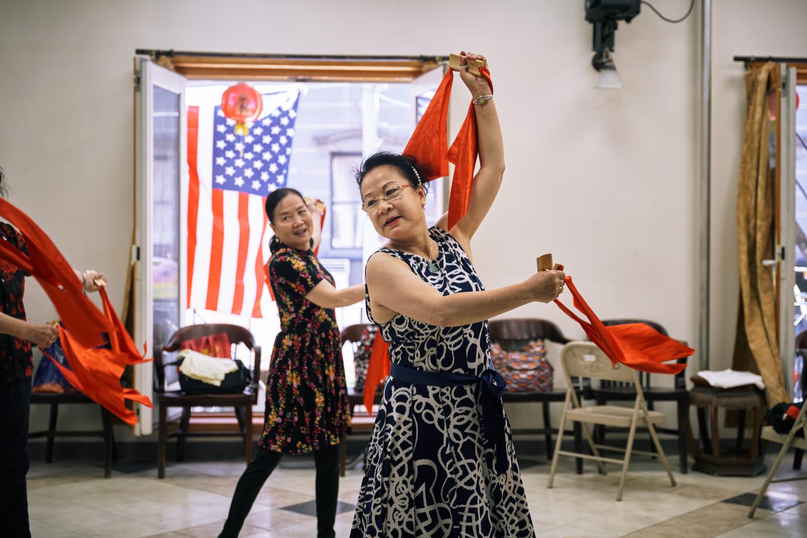 Aizhen Huang practiced dancing ...own, New York on June 30, 2022.