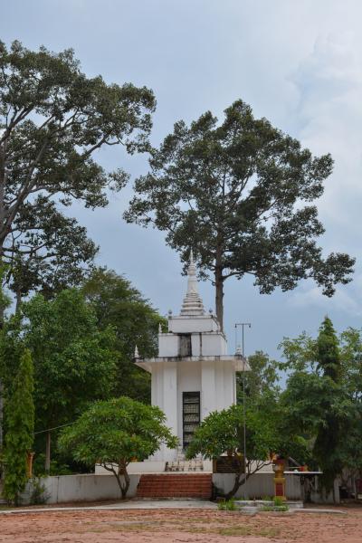 Image from Revisiting Khmer Rouge - Skulls of the victims filled the shrine at the center of...