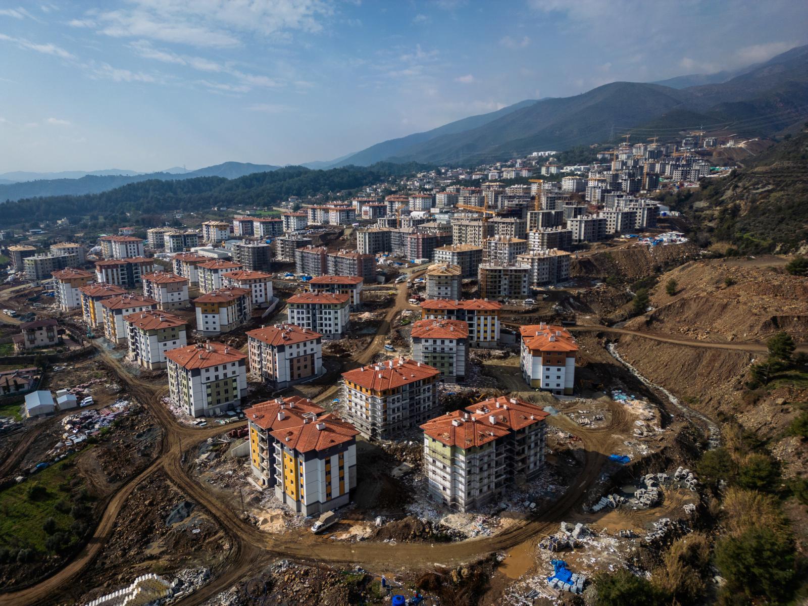 One year on, the ancient city of Antakya struggles to show its first signs of life -  Gulderen construction site &ndash;located up in the mountains where the soil is...