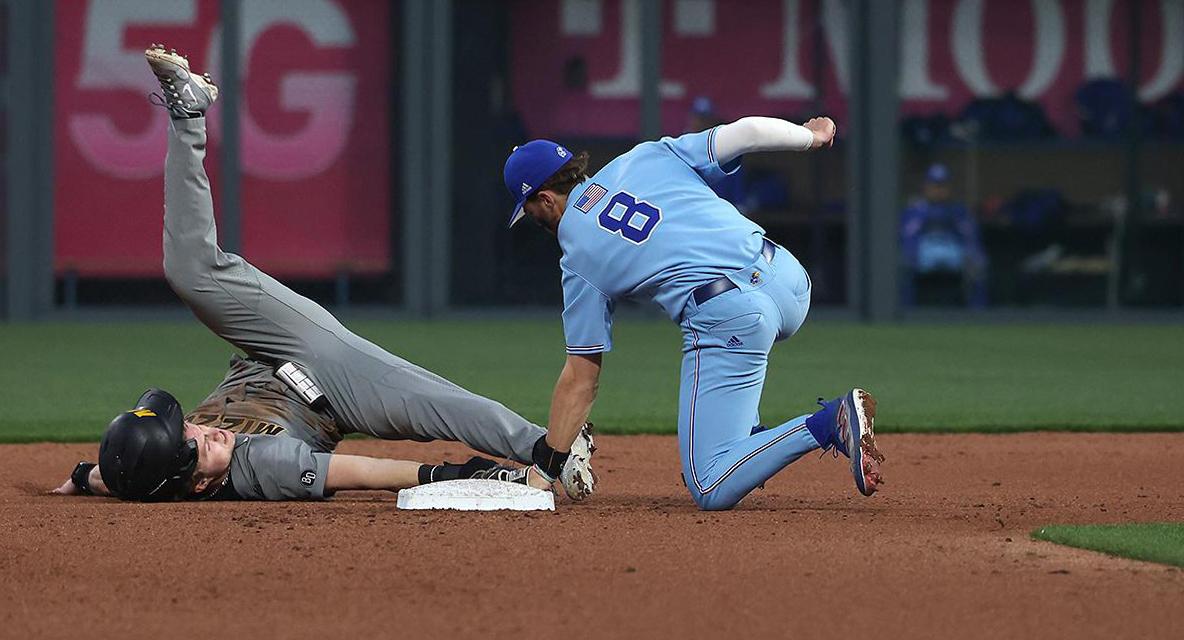 Image from Sports - Missouri right fielder Cam Chick attempts to steal a base...