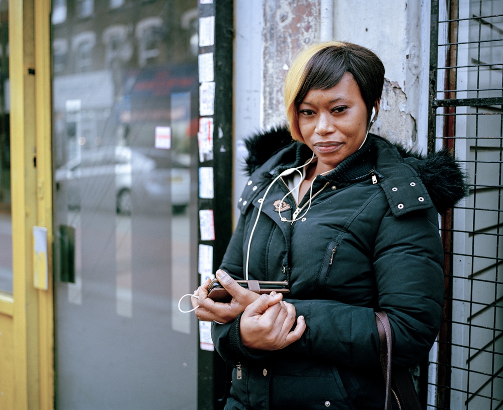  A woman waits for the no41 bus on West Green Road during the morning rush hour. It&rsquo;s a...