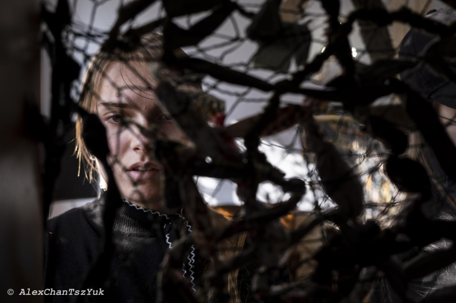 A young teenage girl volunteers... war broke out on February 24. 