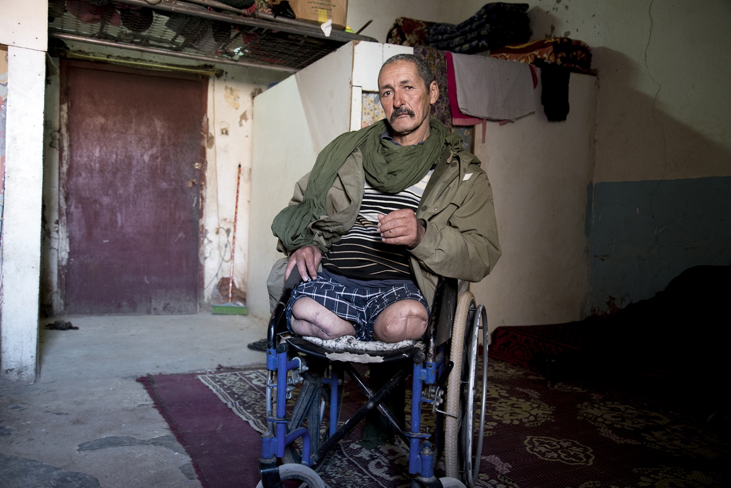Behind The Wall, life of the Sahrawi -  A war veteran in his room in the hospital for war...