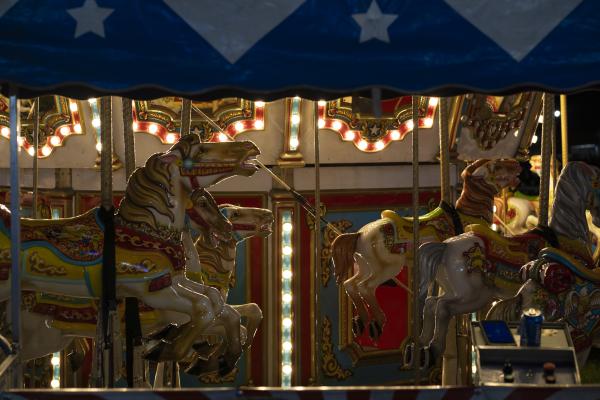 Image from Odds & Ends - Classic rides like the Merry-Go-Round glow at night...