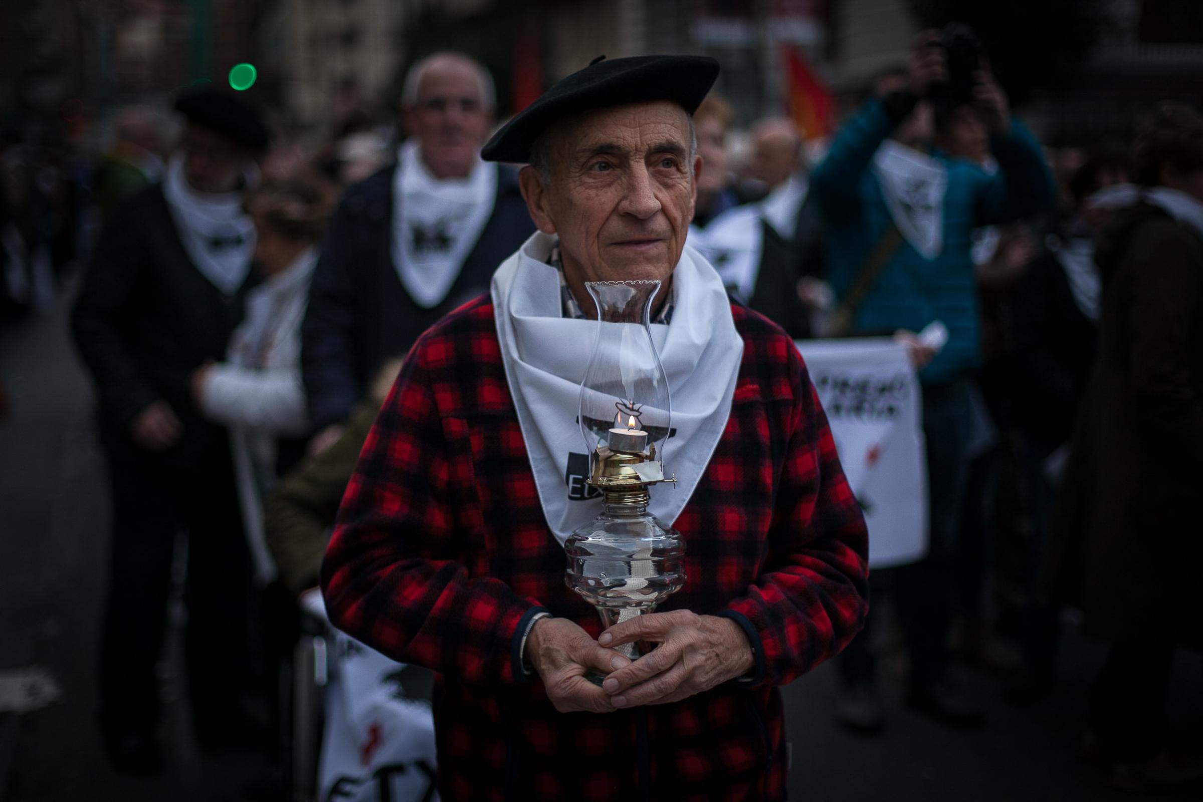 Basque Country - A relative of an ETA prisoner demonstrates in the streets of Bilbao, asking him to serve his...