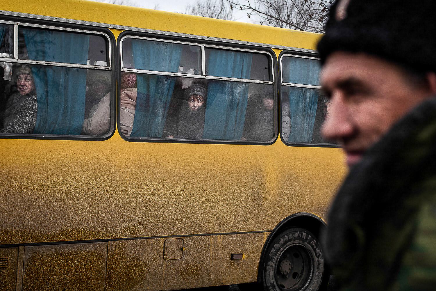 Truce in the Donbas - December 2014. Luhansk. Ukraine. A group of people look...