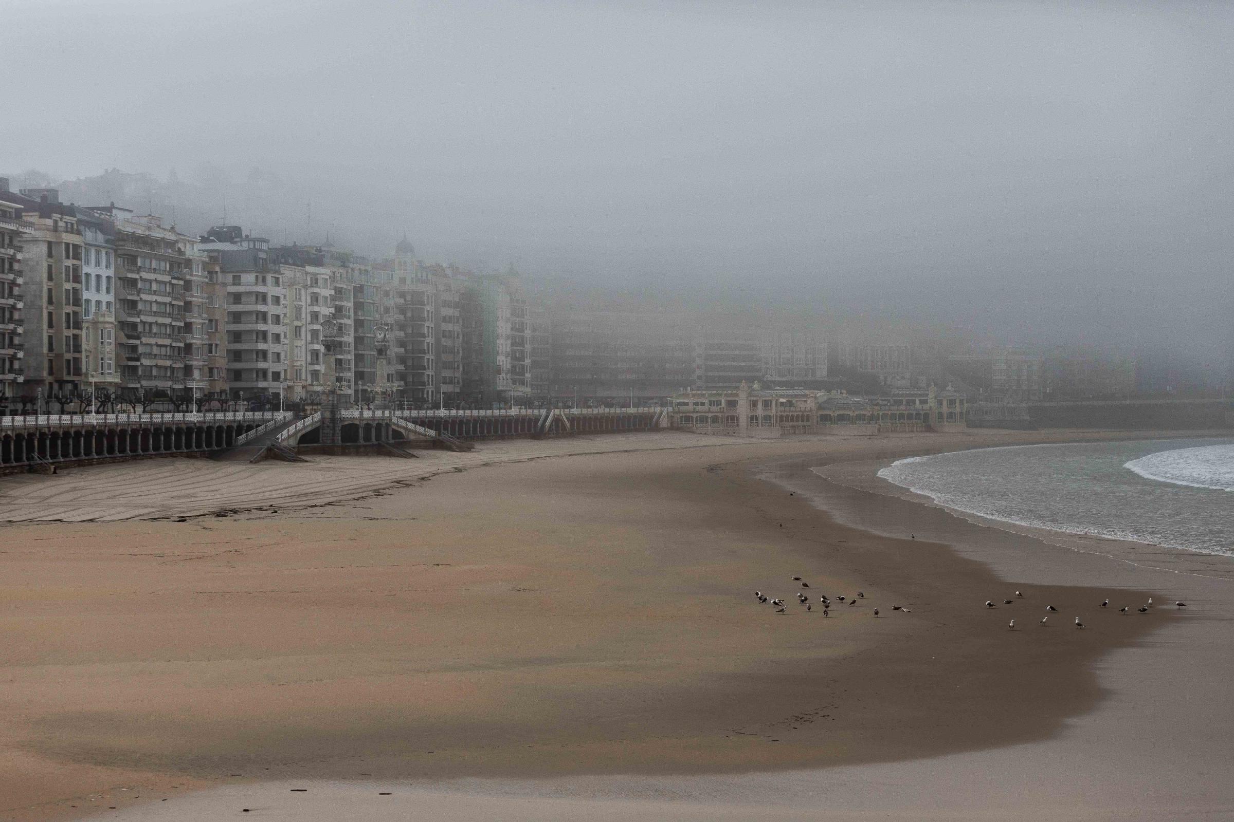  The world-famous La Concha Beach, in San Sebastian, is empty. 