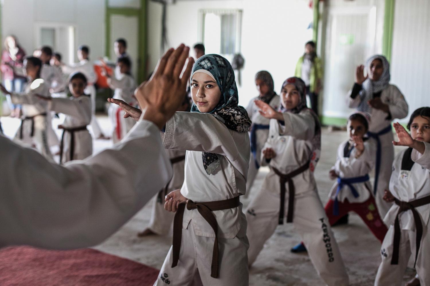 Zaatari Taekwondo School - Zaatari. Jordan. November 2014.  Many of the students...