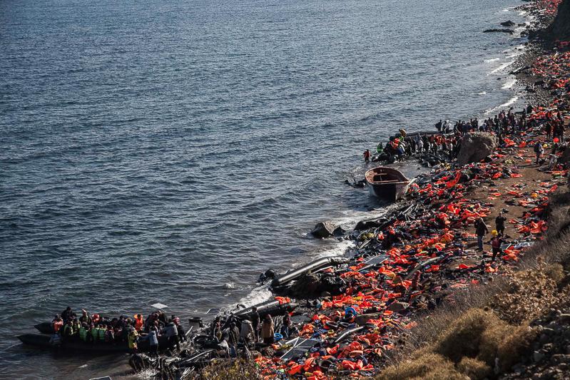 Seeking refuge  - LESVOS, GREECE. Two boats with refugees arrive in the...