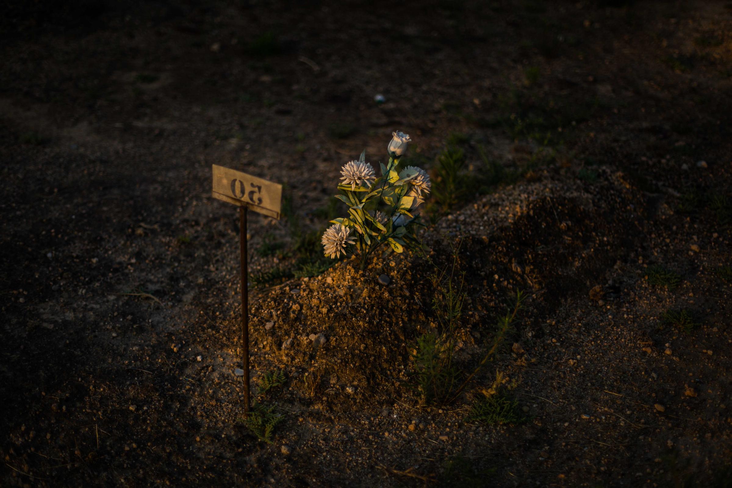 the end of oblivion - About 114,000 people remain buried in graves, ditches or...