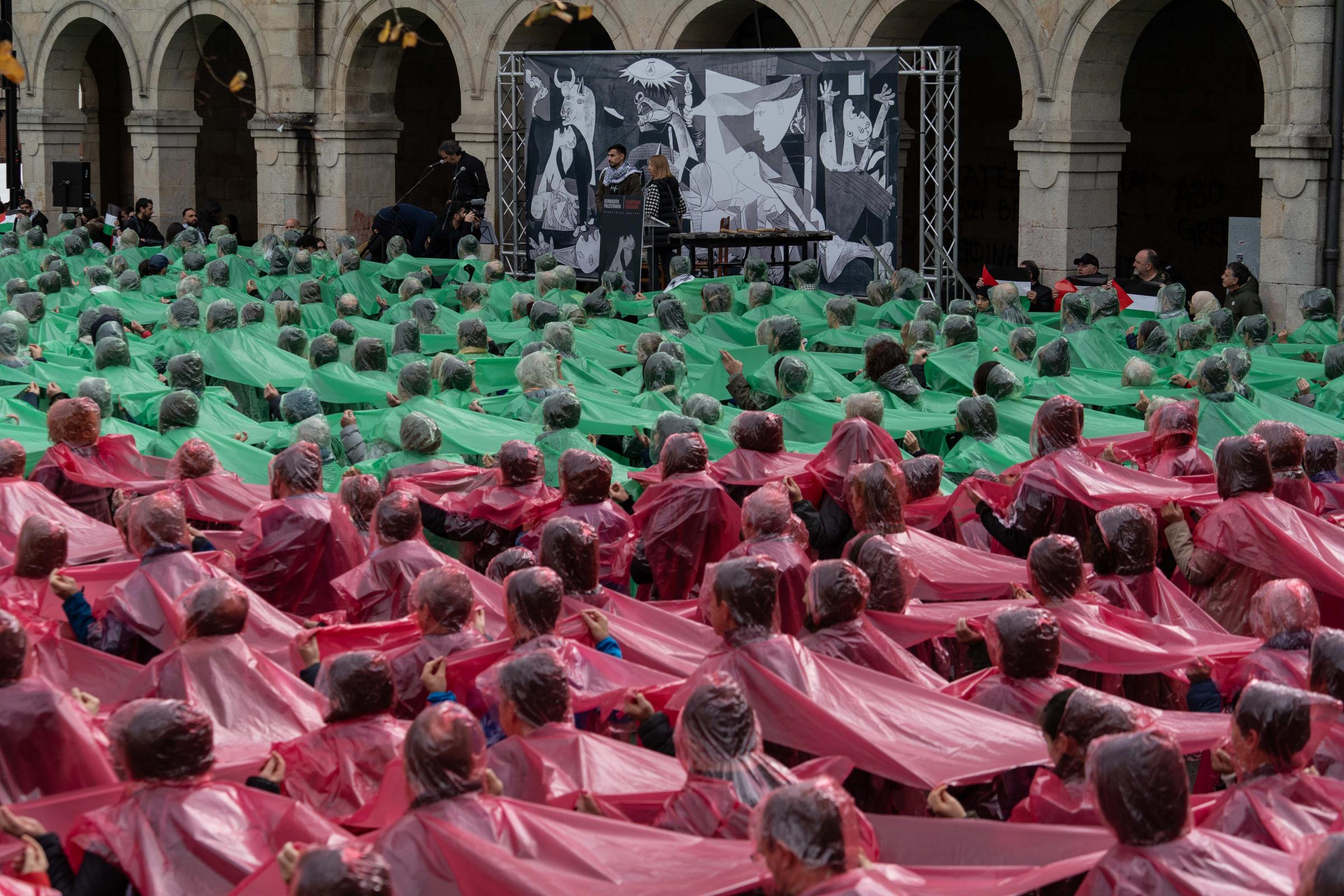 Over 3,000 people form human mosaic in Spain to support Palestine - GERNIKA, SPAIN - DECEMBER 8: Guernica is sadly known for being the first civilian town to be...