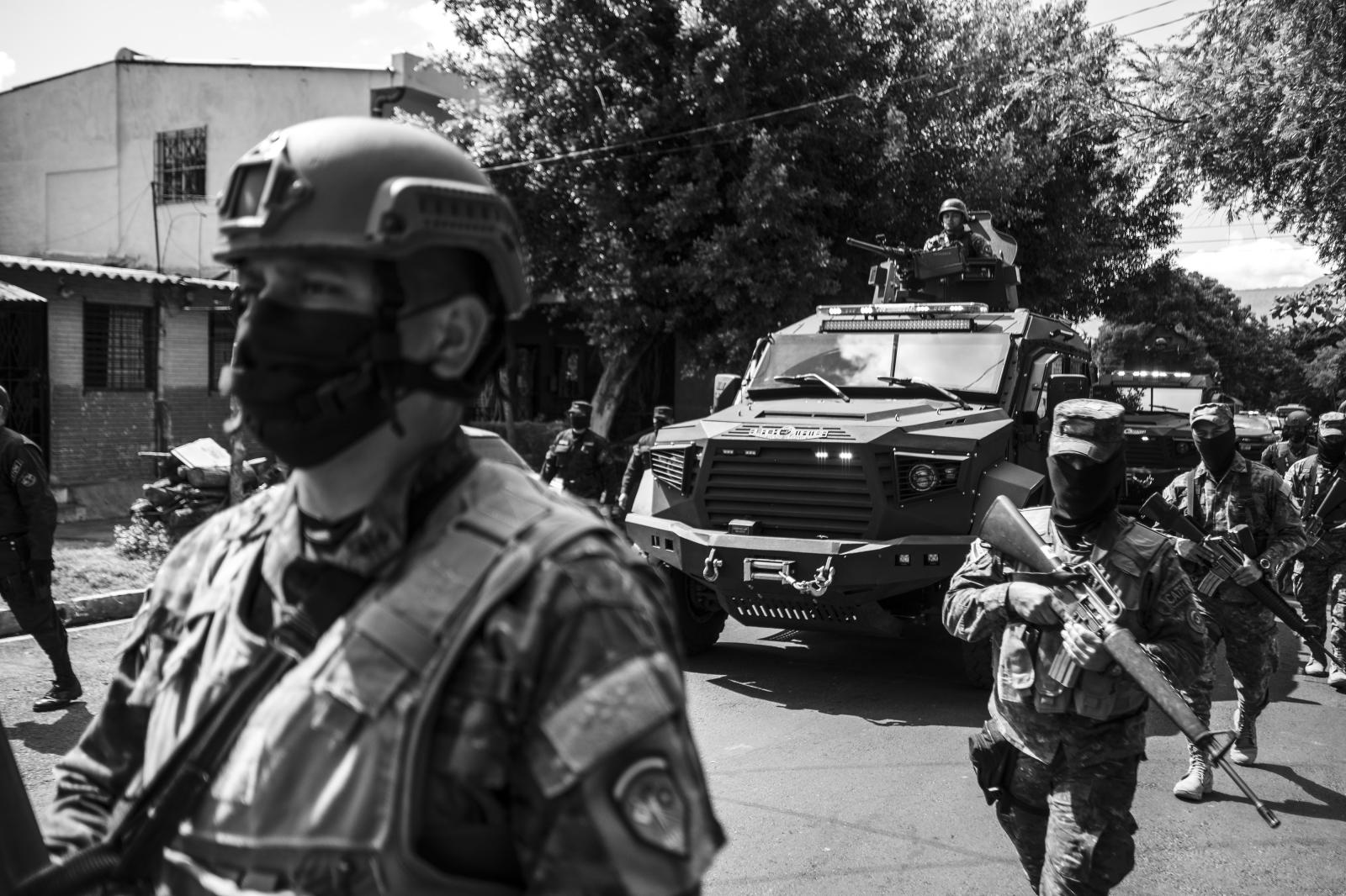 The armed force during a patrol...a neighborhood of San Salvador.