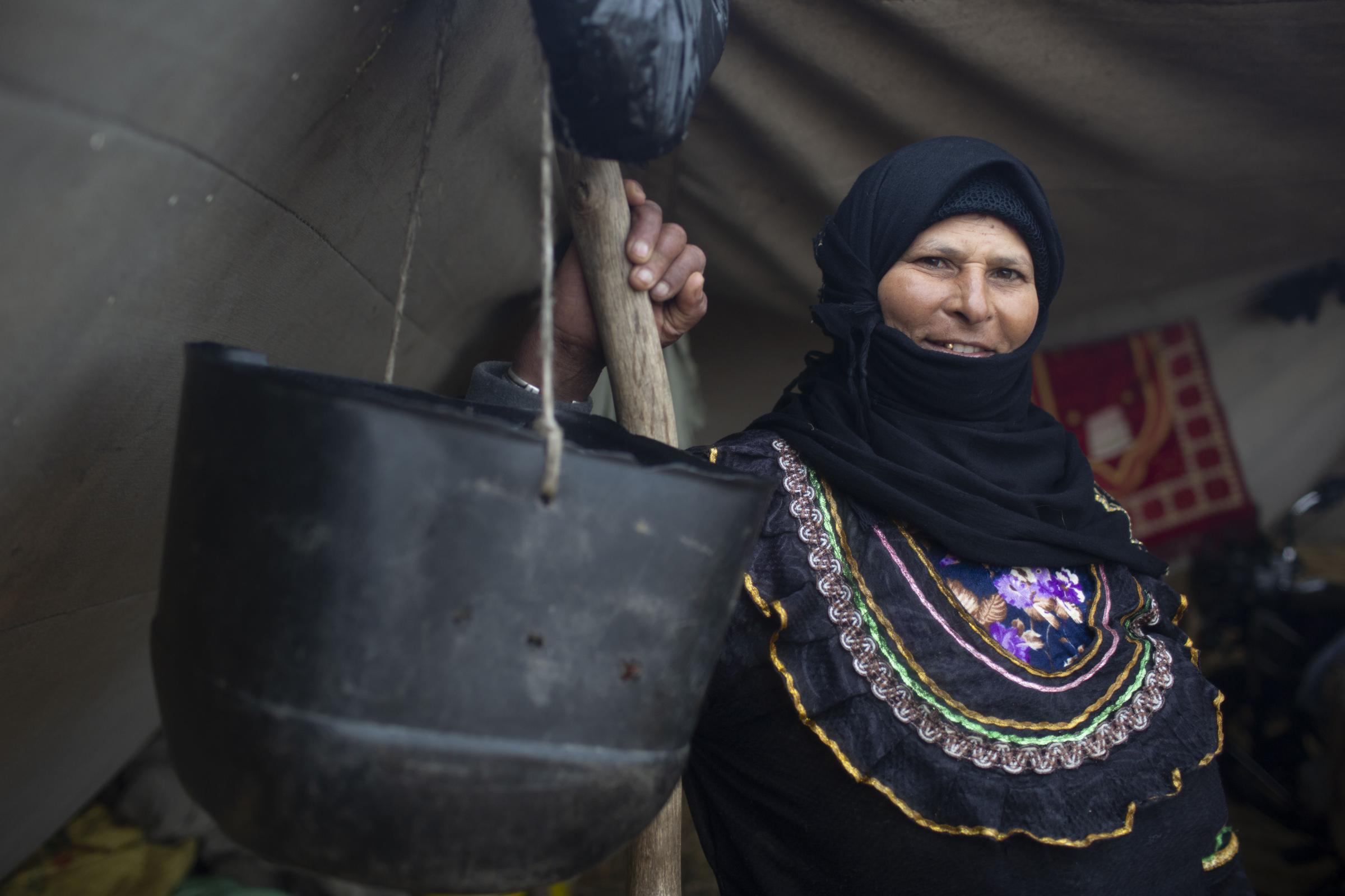 Nomadic Bedouins set up camp by the housing blocks of Egypt's Nile Delta - 