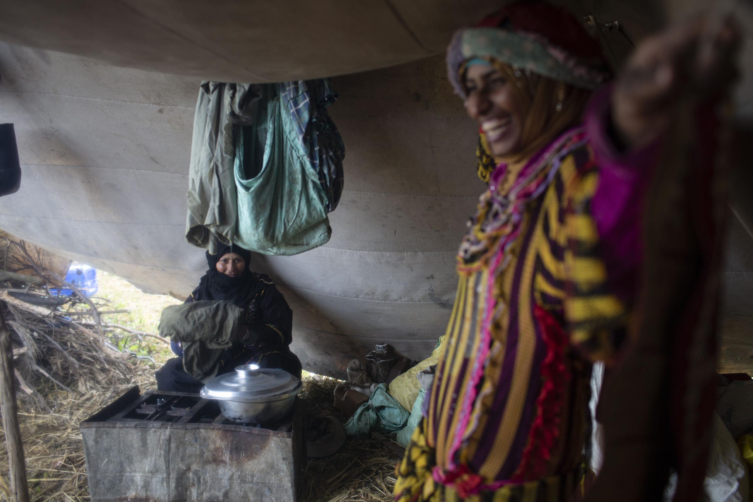 Nomadic Bedouins set up camp by the housing blocks of Egypt's Nile Delta - 
