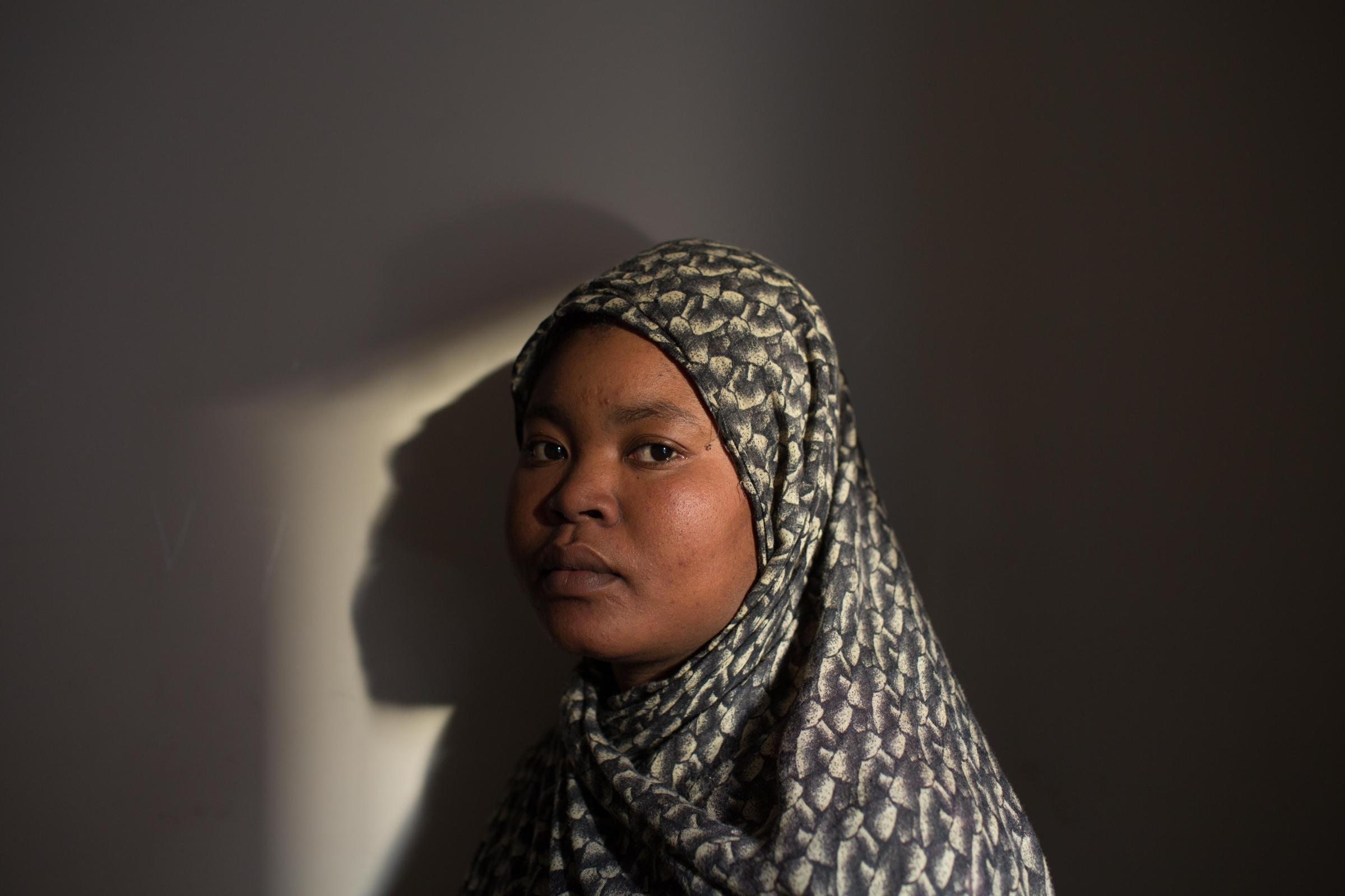 Malaz Al-Bakr Ibrahim, 23, who has worked as a babysitter in Egypt since 2020 because of the economic and political situation in Sudan, poses for a...
