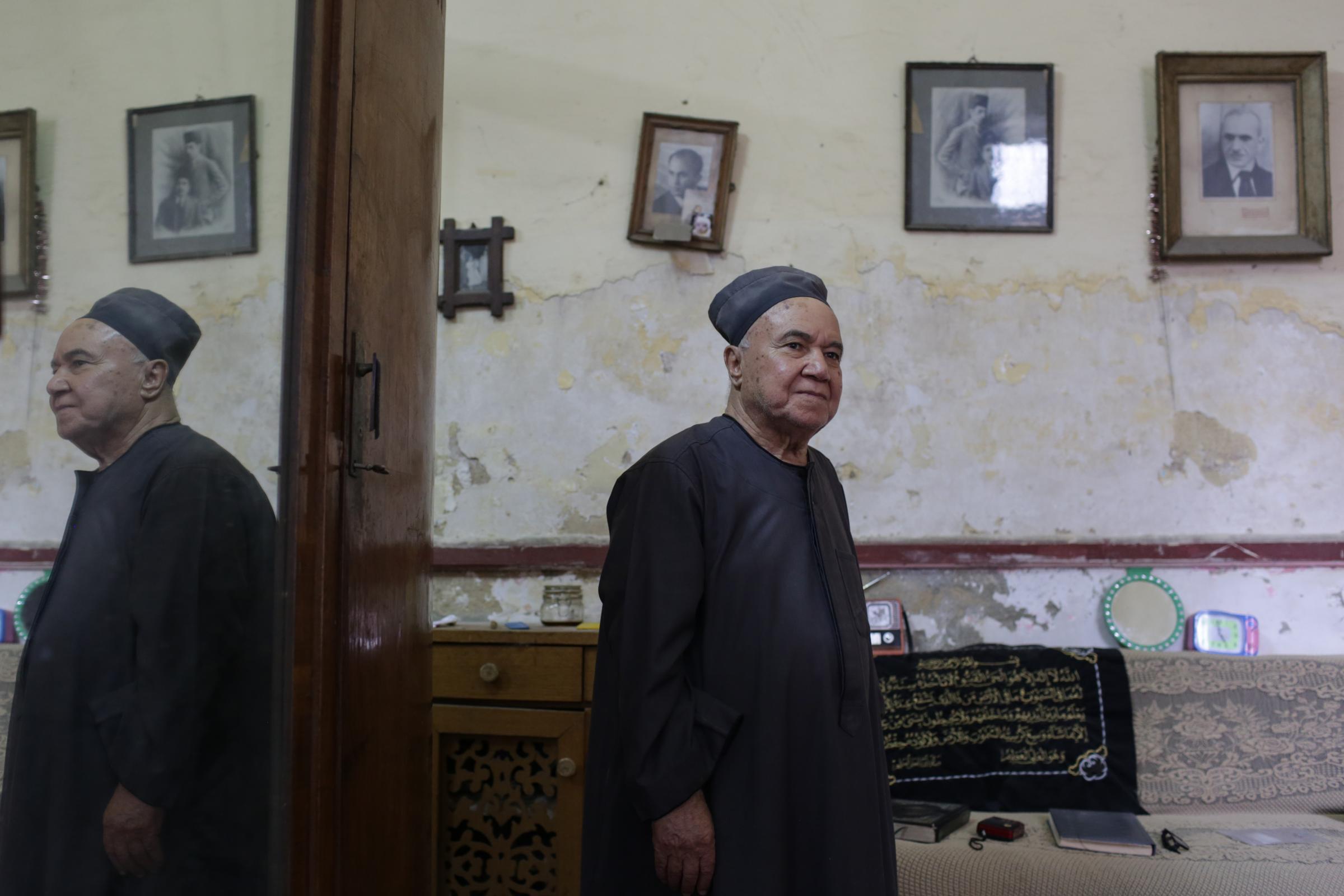 Bulldozers tear into Cairo's historic Islamic cemeteries - Hafiz Shaker, 84, stands inside his Majid house, built in...