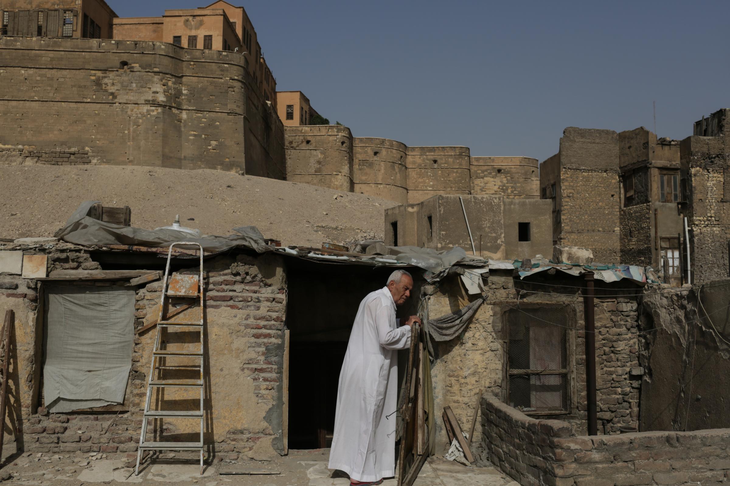 Bulldozers tear into Cairo's historic Islamic cemeteries - Ahmed Maher, 83, stands outside his home in the Majid...