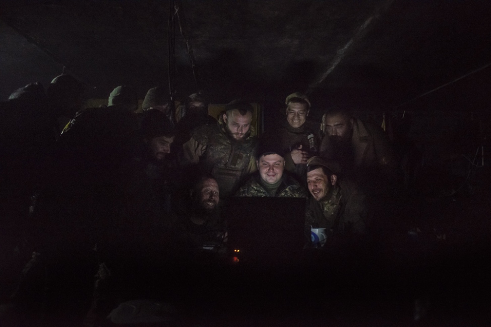  The men watch reconissance foo...into Ukrainian held territory. 