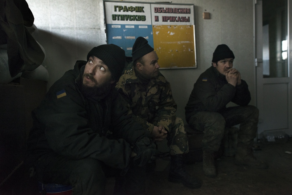 War in Ukraine: Position Santa -  Ivan listens as shells land outside their postition 