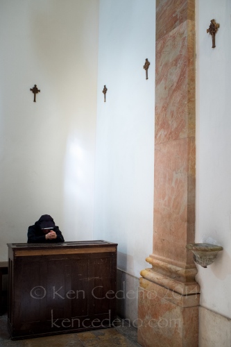 Image from ISRAEL -                 A nun prays in a church in Old Jerusalem,...