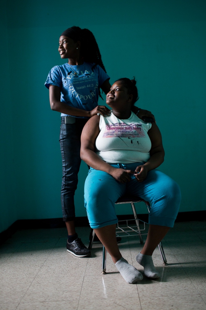 Students Not Suspects -  Collegiate senior Feyisola Oduyebo, 17, right, and her...