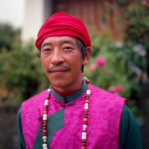 A Naxi priest poses for a photo in a remote mountain village in the Yunnan province of China.