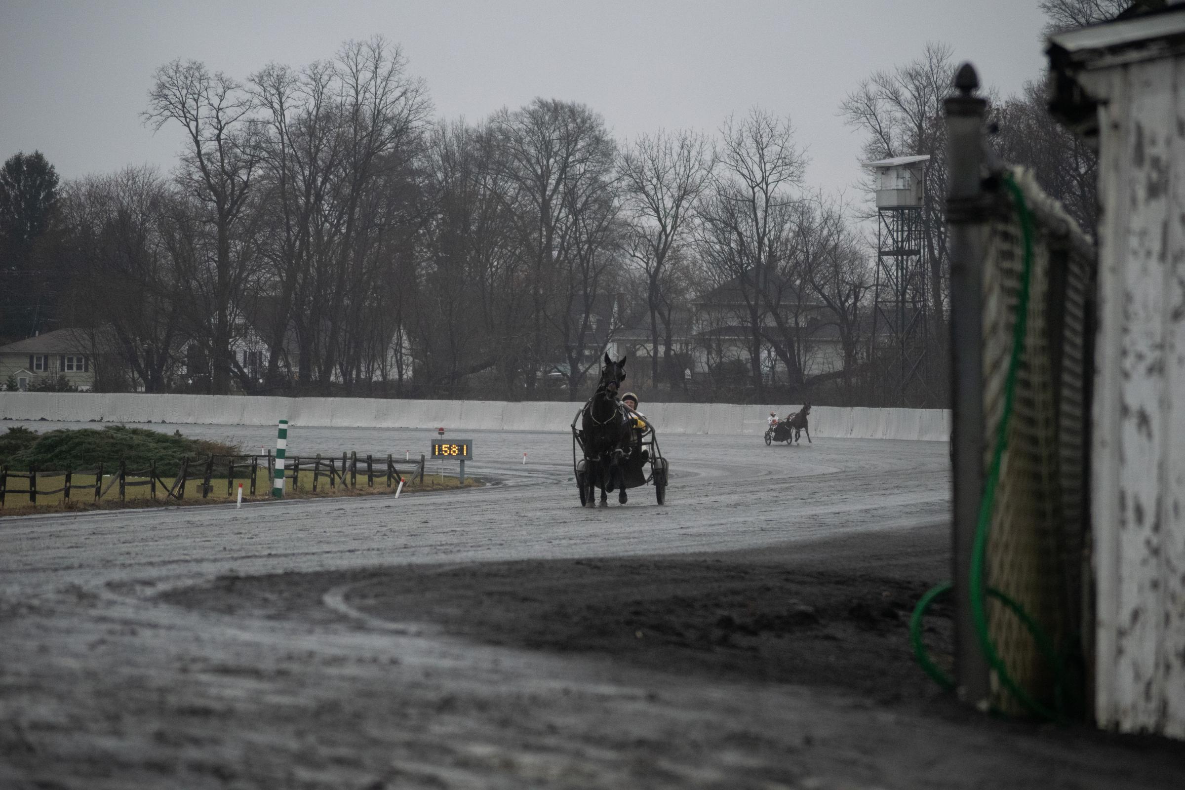 Horse Racing -  Horses compete in the last day of harness racing at the...