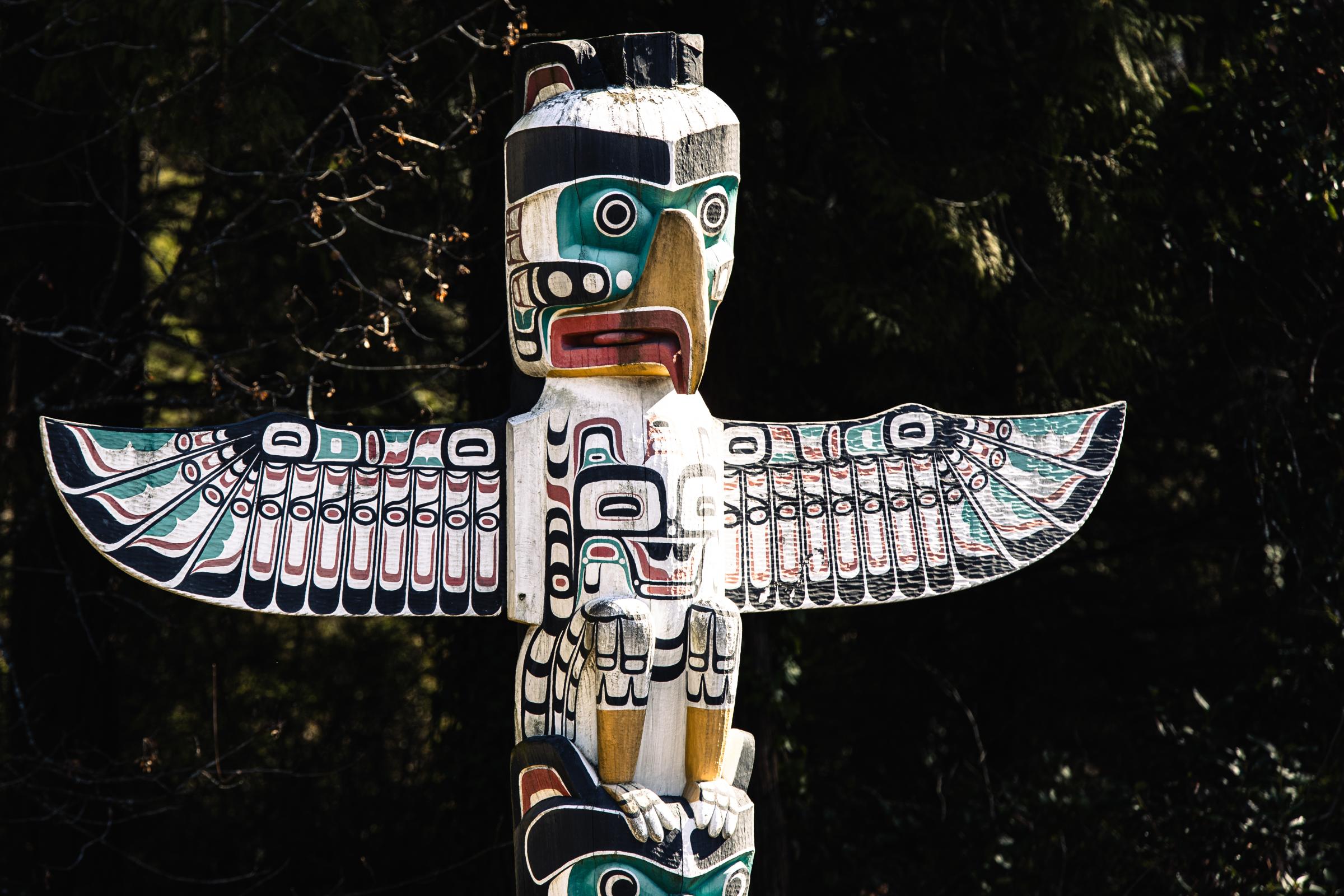 Totem Poles, Stanley Park, Canada. by Mark Spowart