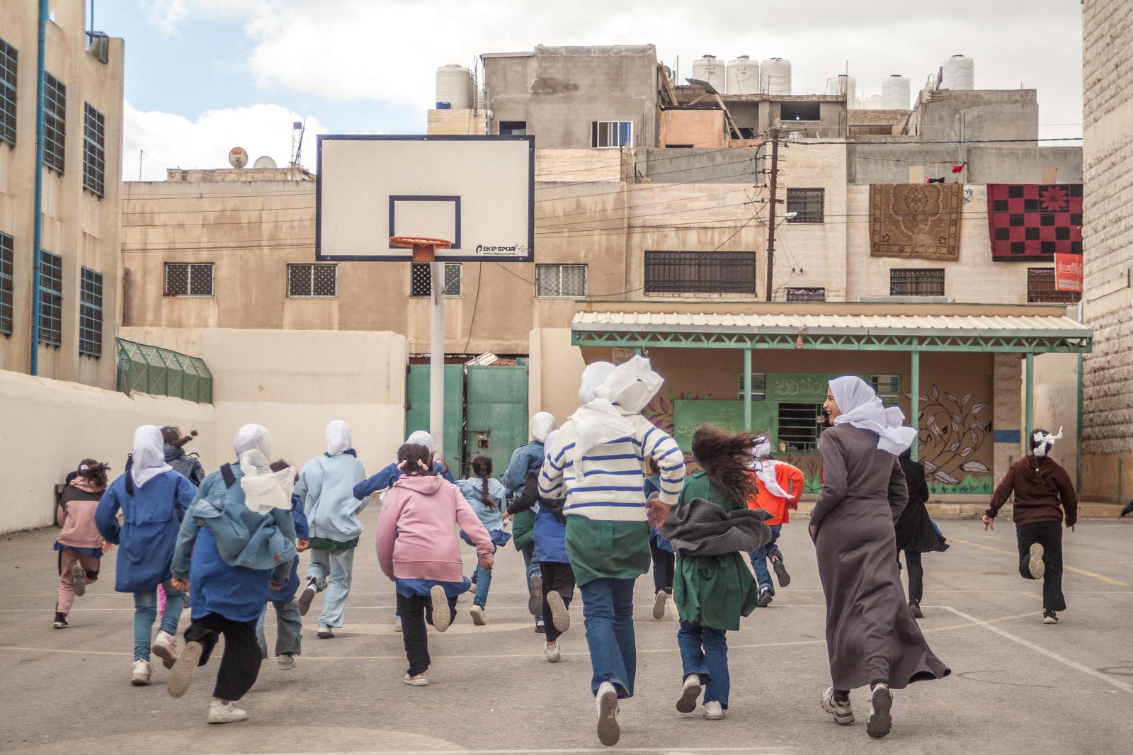 Schoolgirls play in the playgro...0, 2025. Photo: Yousuf Sarfaraz