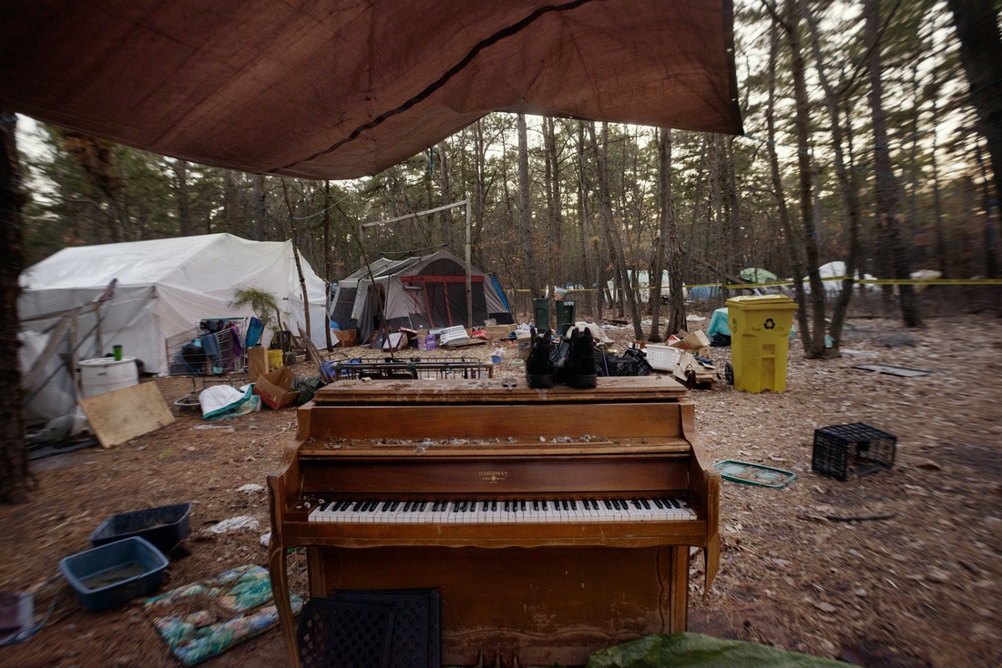 Fringe - Addiction in NJ -   A piano in a makeshift courtyard.   